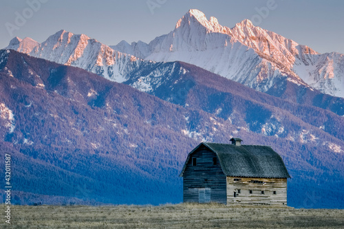 Historic barn at sunset. Flathead Indian Reservation, Montana. photo