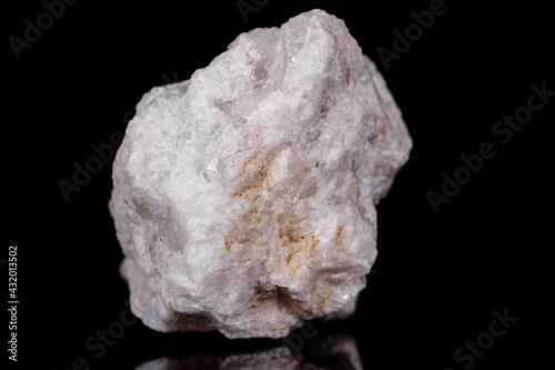 Macro mineral stone Albit on black background photo