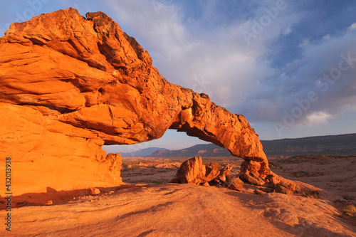 Scenic image of the remote Sunset Arch in the Grand Staircase-Escalante National Monument, Utah. photo