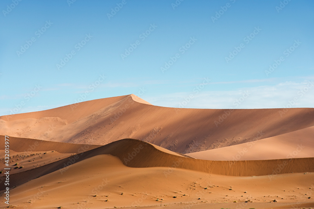 Sand dunes in Sossusvlei, Namib-Naukluft National Park, Namibia. Sand dunes in Sossusvlei, Namib-Naukluft National Park, Namibia.