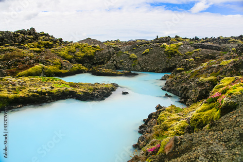 One of the most famous and most beautiful geothermal baths in the world, The Blue Lagoon in Iceland is a very beautiful and surreal landscape. photo