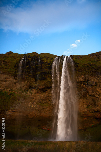 Seljalandsfoss, a waterfall fed by ice melt from the Eyjafjallajokull Glacier, in Southern Iceland.