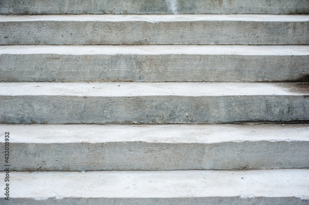Concrete stairs. Texture of gray fresh concrete