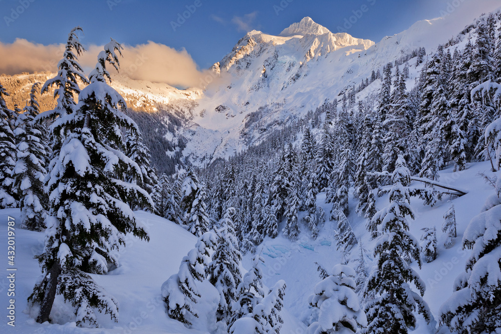 Mount Shuksan at sunset during winter in North Cascades National Park, Washington. Mount Shuksan at sunset during winter in North Cascades National Park, Washington.