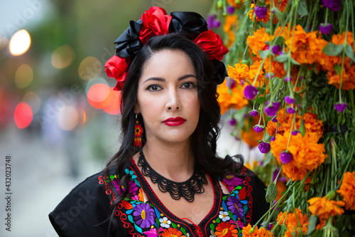 Young woman wearing her Mexican-style dress