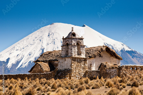 An old colonial-era church located on the high-altitude Altiplano in Sajama National Park in Bolivia. photo