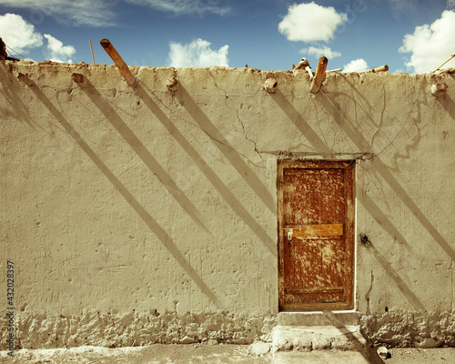 A door on the side of a building in the village of Stok in Ladakh, Jammu & Kashmir, India;