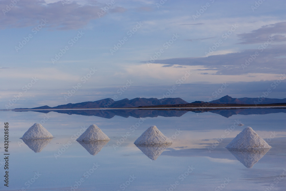 Piles of salt made by salt miners, dry during the rainy season in the