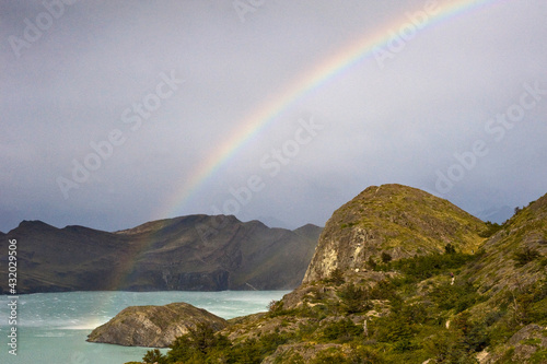 Waterspouts and rainbows during a day of stormy weather with 100 mph wind gusts in Torres del Paine, Patagonia, Chile.