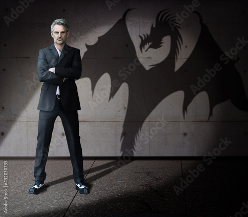 Strength strong dragon entrepreneur businessman super hero. CEO manager in a suit, his true self is a dangerous dragon. Ladder to success. Business self-presentation superman. Financial shark.