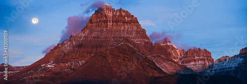 full moon setting, Mount Wilbur, Glacier National Park, Montana