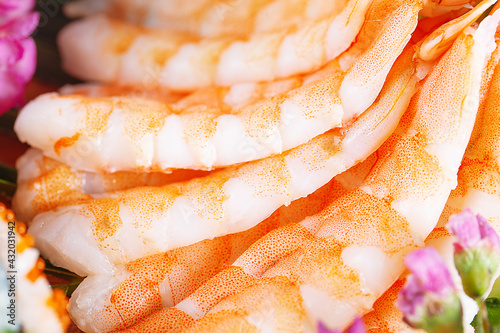 Peeled king prawns meat close-up photo