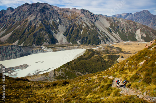 Hikers climb the steep slopes up to Muller Hut in New Zealand's Southern Alps in Aoraki/Mt. Cook National Park in the South Island. photo