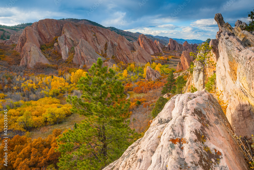 © Tandem Stock - The luster of fall colors fill the valley between the Lyons and Fountain Sandstone formations in Roxborough State Park.