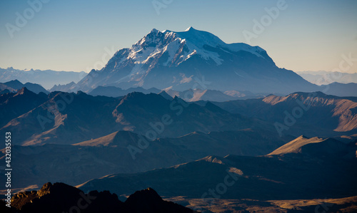 The view from three quarters of the way up Mt. Huayna Potosi as the morning begins to light the valleys behind the Cordillera Real, Bolivia.