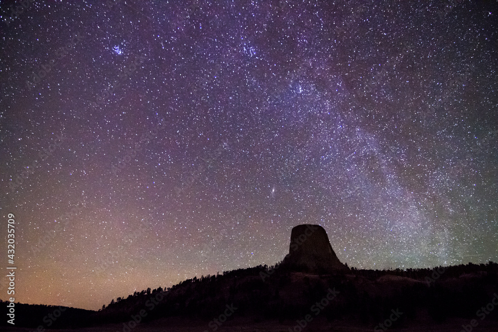 The Milky Way Galaxy stretches above Devil's Tower in Devil's Tower National Monument, Wyoming. The Milky Way Galaxy stretches above Devil's Tower in Devil's Tower National Monument, Wyoming.