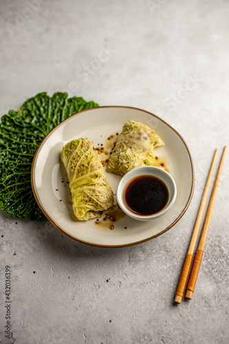 Leaves of Savoy cabbage stuffed with vegetables. Asian cabbage rolls. Vegan. Top view.