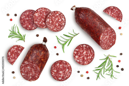Fotografia Smoked sausage salami with slices isolated on white background with clipping path and full depth of field