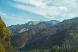 Panorama overlooking the mountains in the clouds. Landscape of the Caucasus Mountains. Fall. Day Georgia.