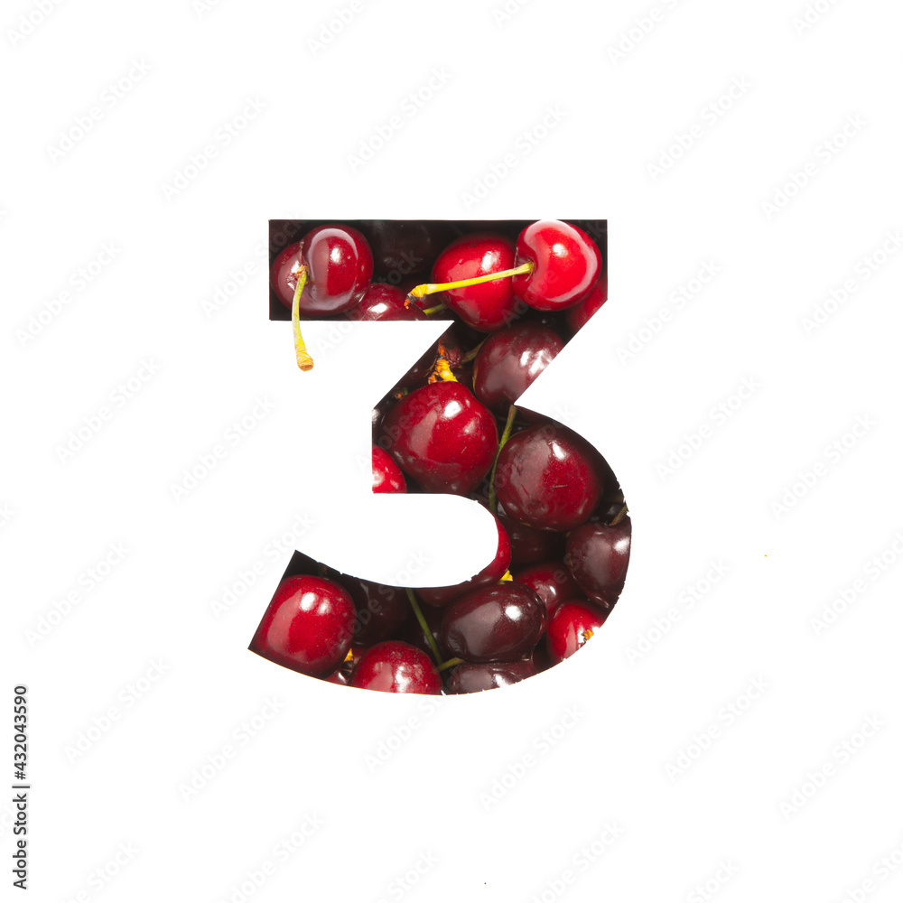 Φωτογραφία Number three of cherries and paper cut in shape of third numeral isolated on white