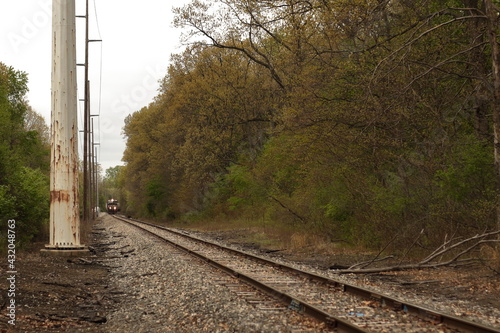 Locomotive coming down the rail line