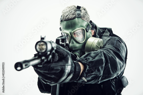 Man with Automatic Rifle wearing Gas mask 