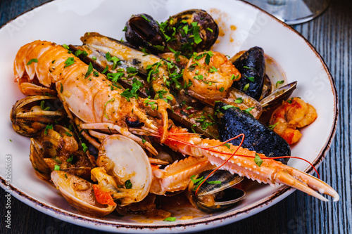 Seafood platter. Langoustine, vongole, shrimps, prawns, clams, mussels, scallop
