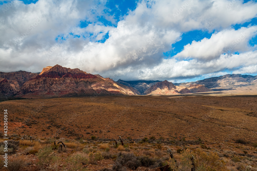 Late Morning Sun and Clouds on La Madre Mountain Range Wilderness. Bridge Mountain and White Rock Hills from Lower Red Rock Parking Area