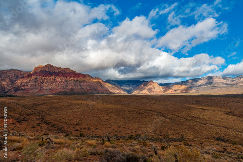 Late Morning Sun and Clouds on La Madre Mountain Range Wilderness, Bridge Mountain and White Rock Hills from Lower Red Rock Parking Area