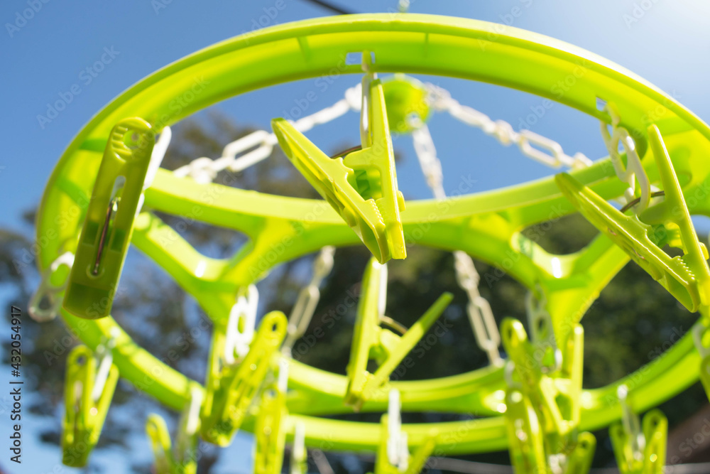 Green clothespin, household equipment, green, clean clothes Green clothespin, household equipment, green, clean clothes
