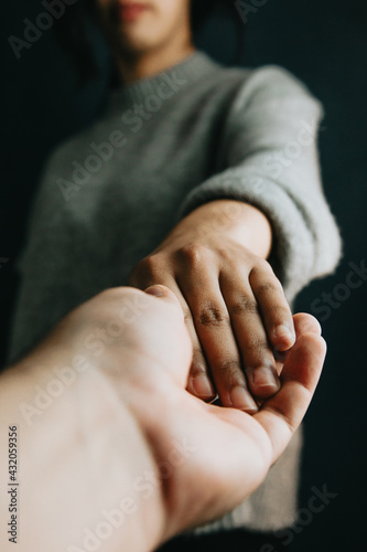 Fototapete Man and woman holding hands, help and self help concept, mental health