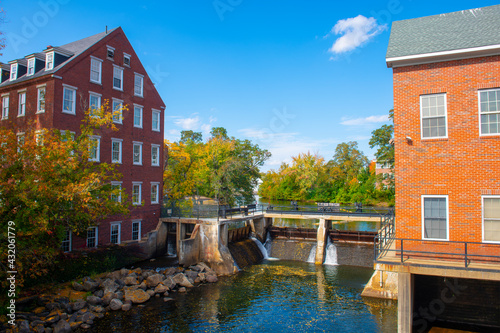 Busiel Seeburg Mill on Opechee Bay Reservoir at 1 Mill Plaza in city of Laconia, New Hampshire NH, USA.  photo