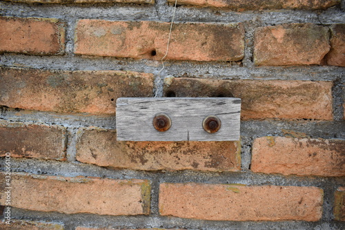old brick wall with hole