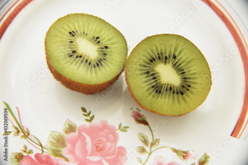 Fresh Kiwi fruits on white background 