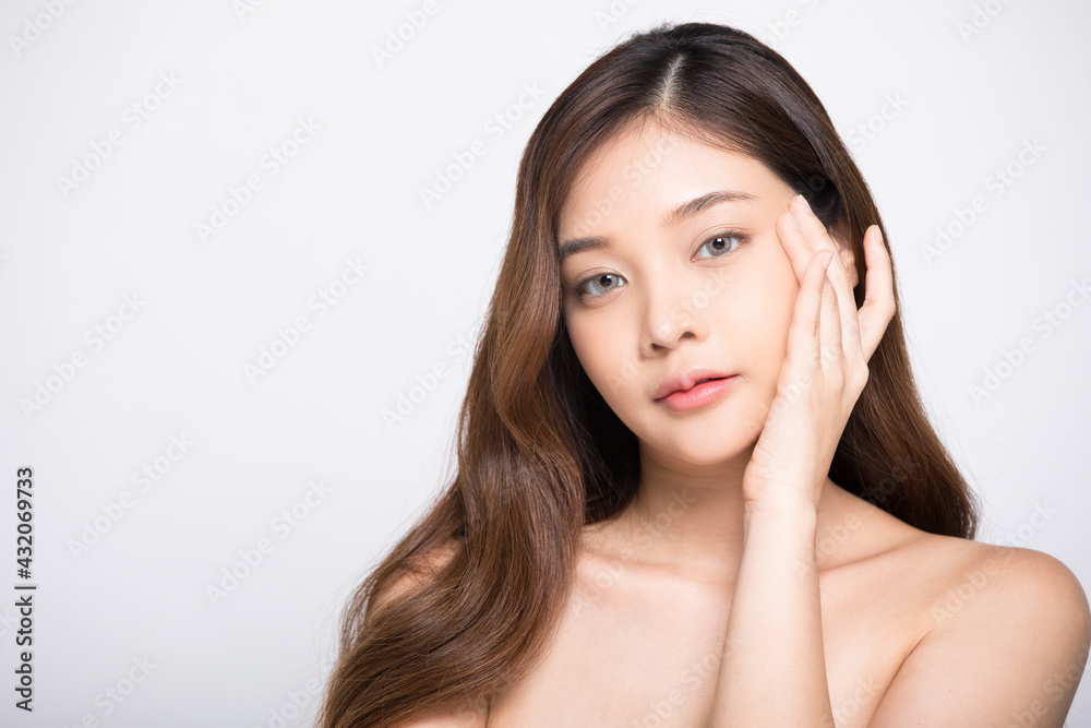 Portrait of young woman model posing with her hands isolated on white studio background Portrait of young woman model posing with her hands isolated on white studio background