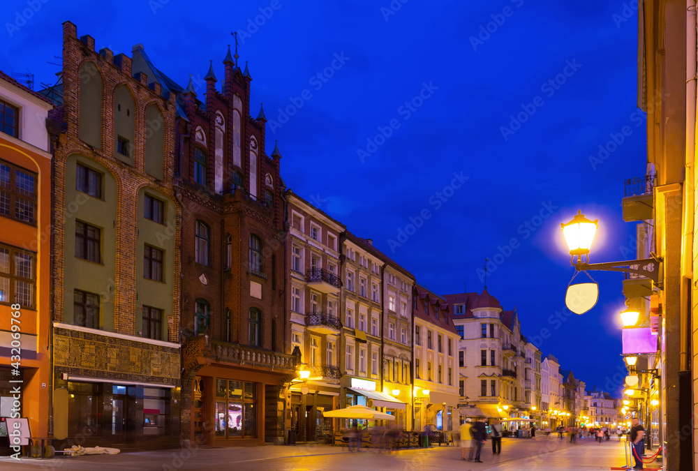 Fototapeta premium Image of Torun city historical streets and building at evening in Poland