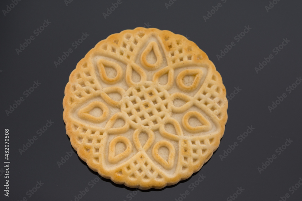 round biscuits cracker isolated on blaack background round biscuits cracker isolated on blaack background