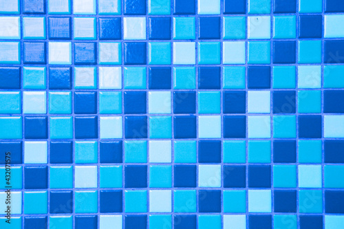 Pattern of Blue mosaic tiles on the wall texture background