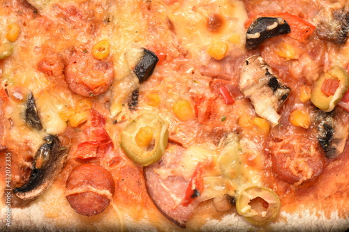 homemade pizza with olives and cheese, detail