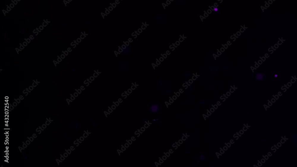 Thin and subtle purple bokeh balls floating for film overlay.