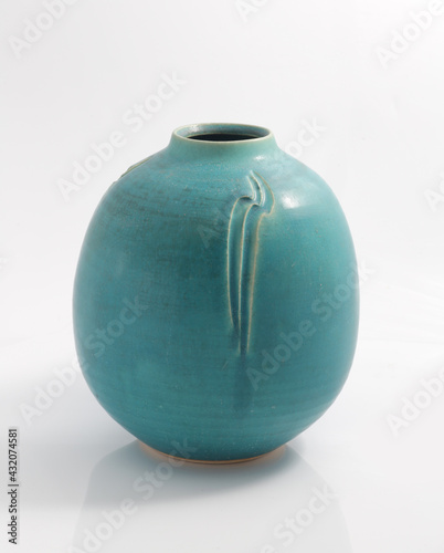 a vintage ceramic vase on white background