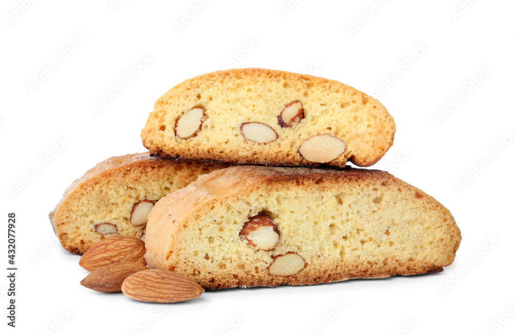 Slices of tasty cantucci and nuts on white background. Traditional Italian almond biscuits Slices of tasty cantucci and nuts on white background. Traditional Italian almond biscuits