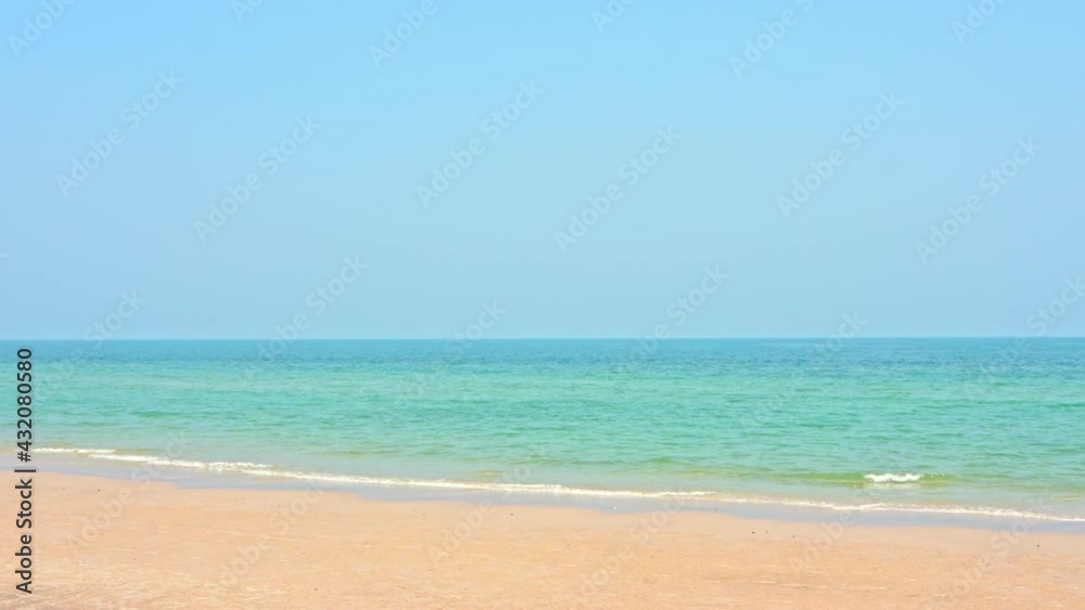 White sand beach and emerald tranquil sea tides, cloudless sky, vacation template, copy space Minimalistic White sand beach and emerald tranquil sea tides, cloudless sky, vacation template, copy space Minimalistic