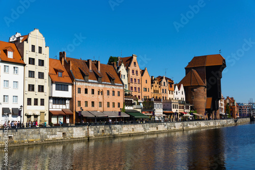 Image of embankment in historical part of Gdansk at sunny day, Poland