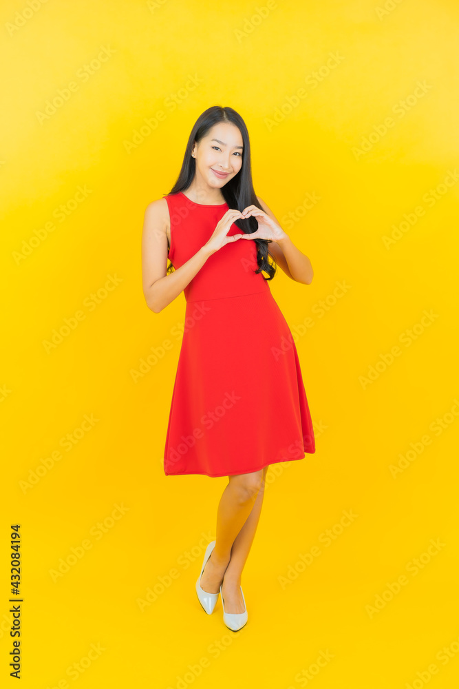 Portrait beautiful young asian woman smile with action Portrait beautiful young asian woman smile with action