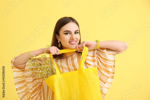 Stylish young woman with sh...