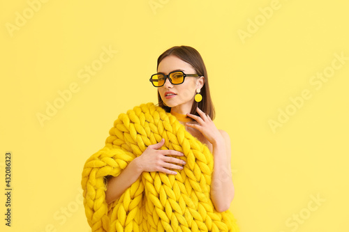 Stylish young woman with kn...