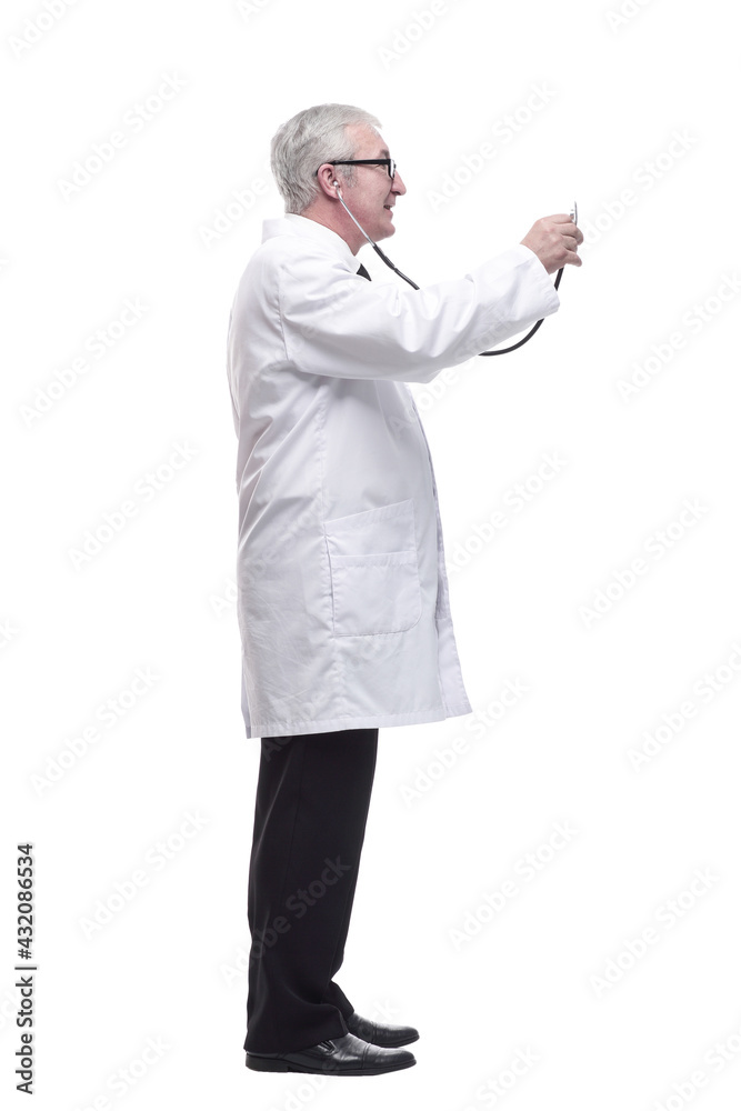 in full growth.friendly mature doctor with a stethoscope in hand.