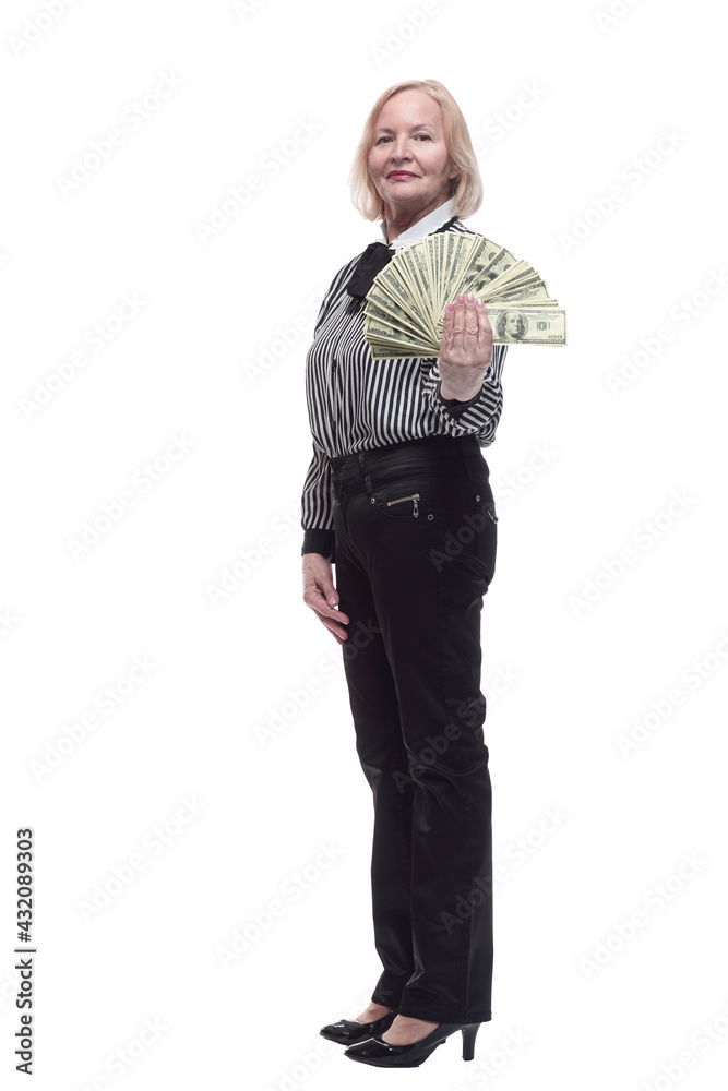 in full growth. attractive business woman with a fan of banknotes in full growth. attractive business woman with a fan of banknotes