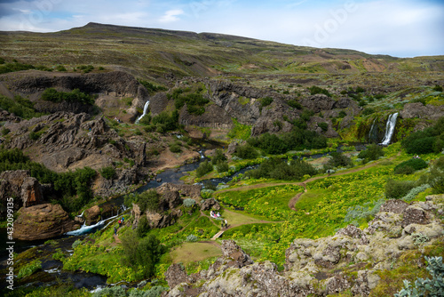  Scenic landscape of Hjalparfoss on the South of Iceland
